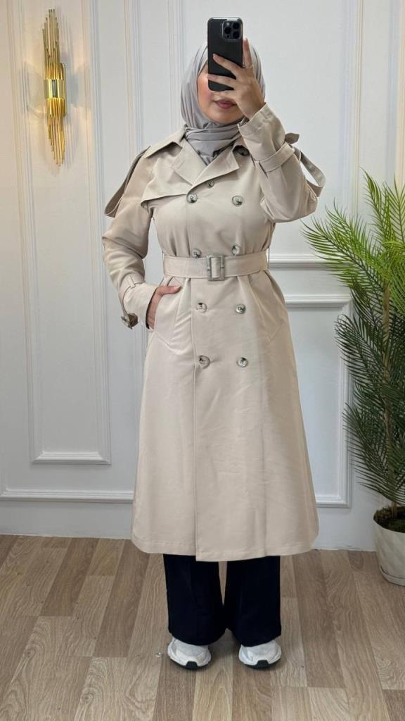 Elegant trench coat for veiled women with a long cut and a belt ideal for formal looks Model 1257 Ecru