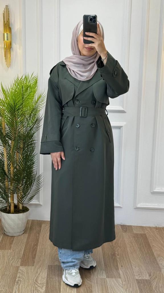 Long trench coat for veiled women with double buttons and a waist belt, elegant and perfect for winter looks. Model G1314 - Khaki