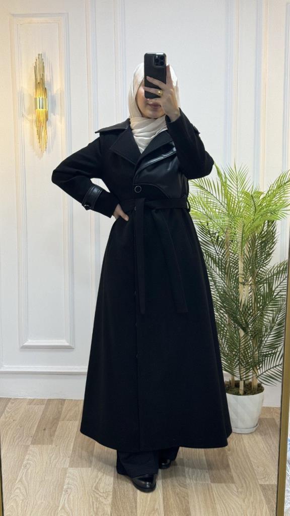 Elegant long coat for veiled women with leather details and a waist belt, perfect for winter looks model M9027 - Black