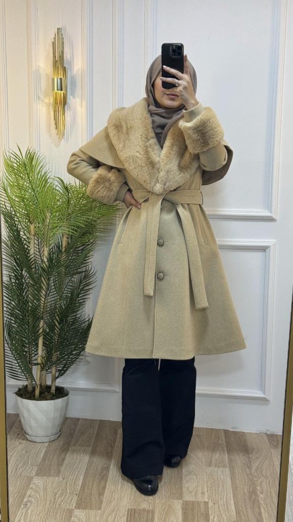 Stylish winter coat with fur collar and sleeves, and belt that highlights the waist, model m9025 - gold